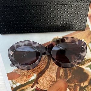 Alaïa 52mm round women’s sunglasses